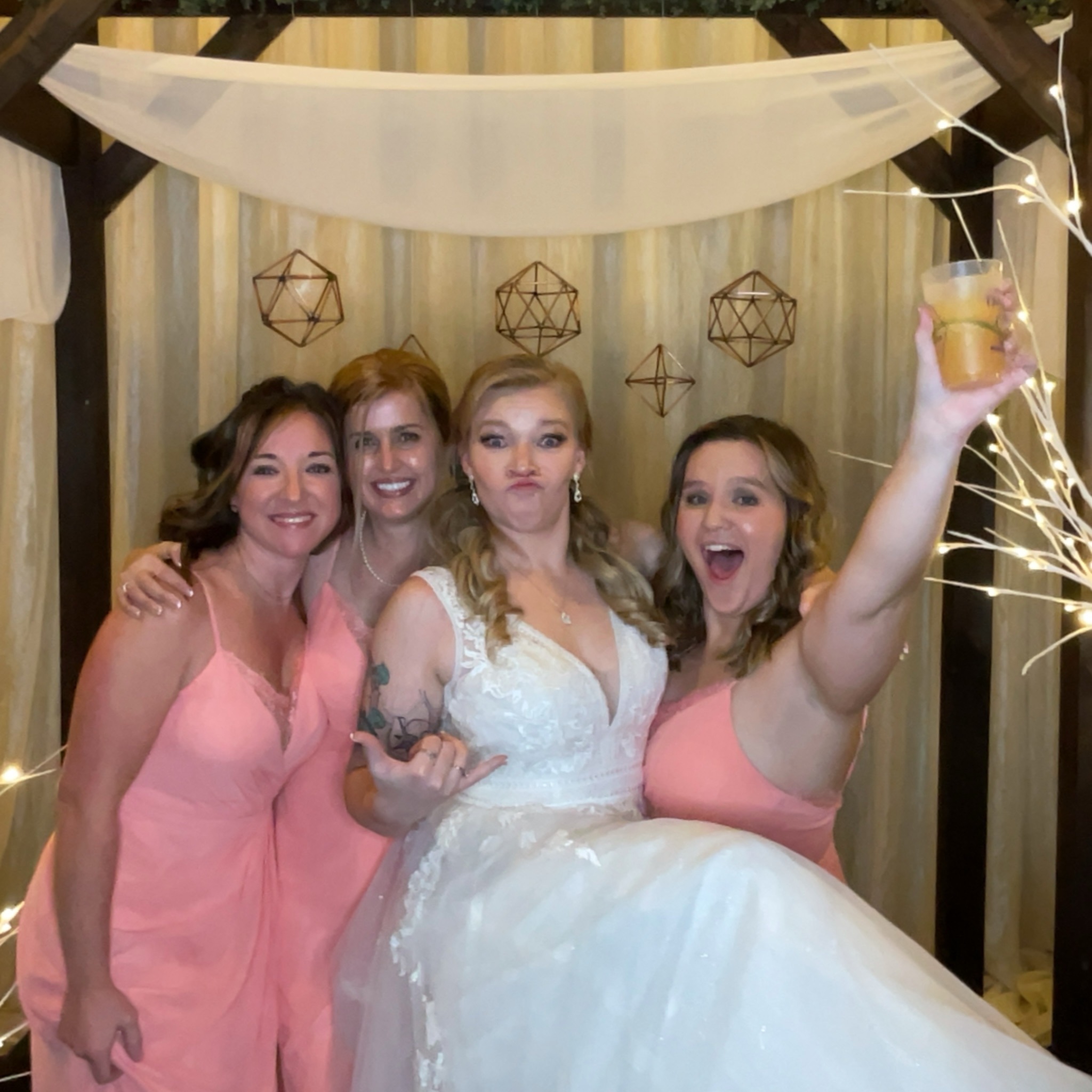Wedding guests using the photo booth at Historic 1625 Tacoma Place