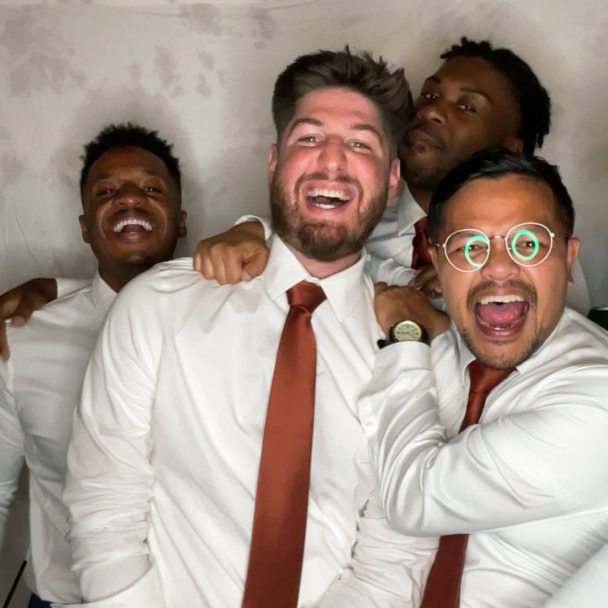 Wedding guests having fun with a classic photo booth