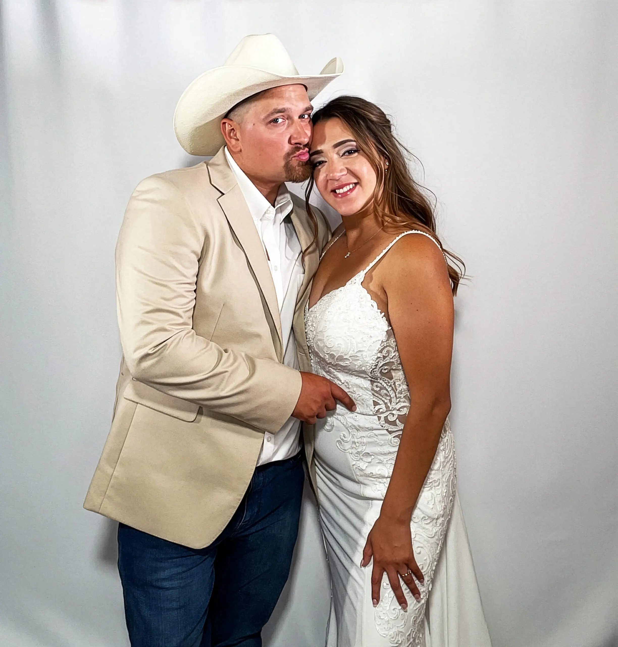 Wedding guests using a classic photo booth