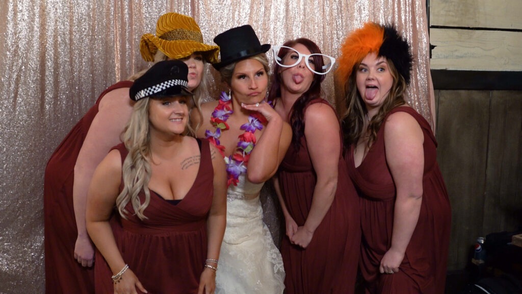 Guests enjoying a Pebble photo booth rental at an event